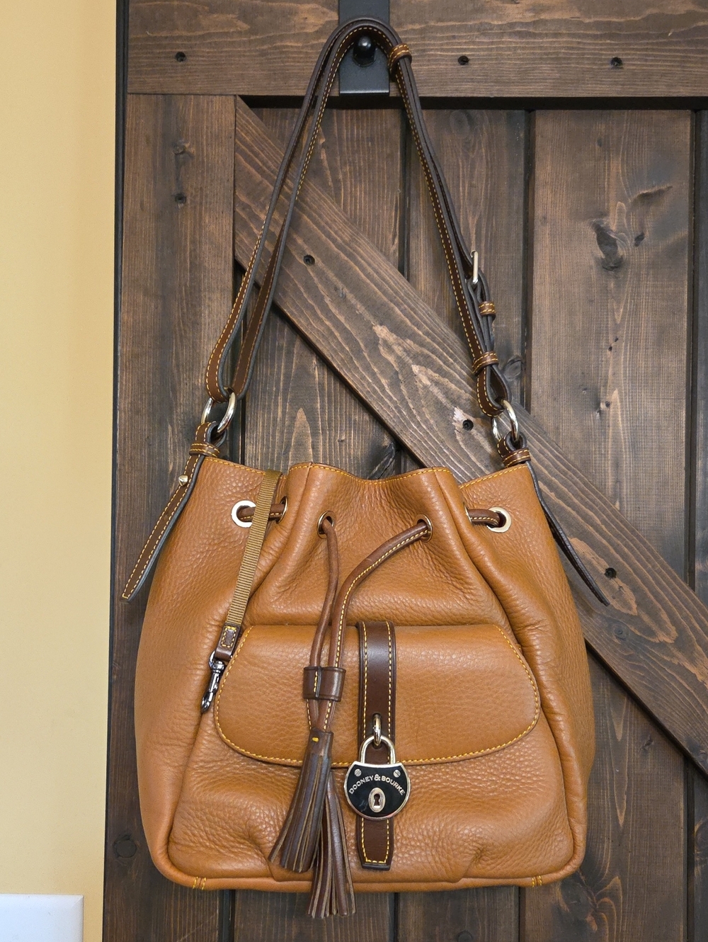 Dooney & Bourke Tan/Cognac Leather Drawstring Shoulder Bag with Tassel